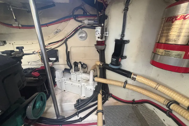 Slide: The Image of Engine compartment of a 2006 Formula 34 Performance Cruiser with Westerbeke generator. - 50