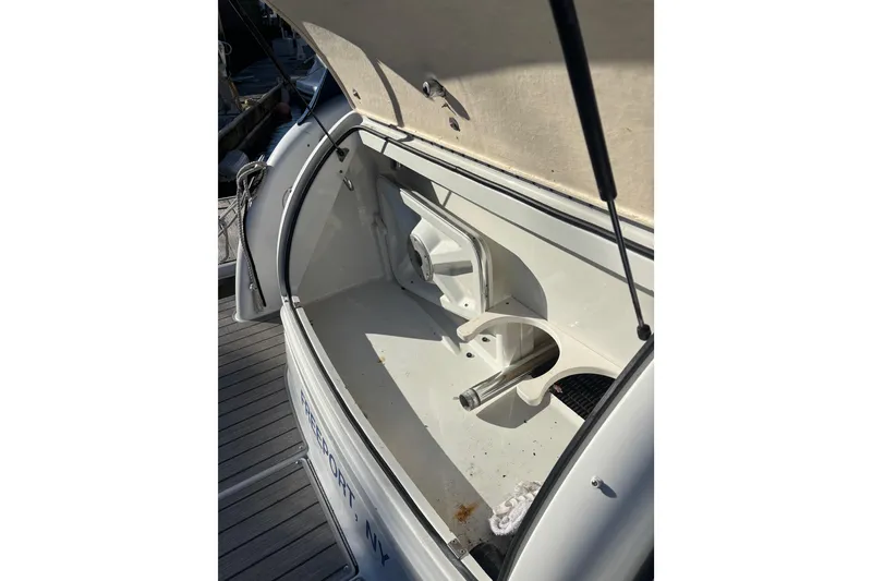 Slide: The Image of Red Westerbeke engine control panel with preheat, start, stop switches on 2006 Formula 34 Performance Cruiser. - 57