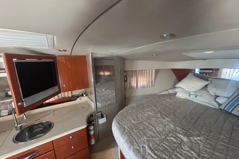 Slide: The Image of Open storage compartment of a 2006 Formula 34 Performance Cruiser boat. - 58