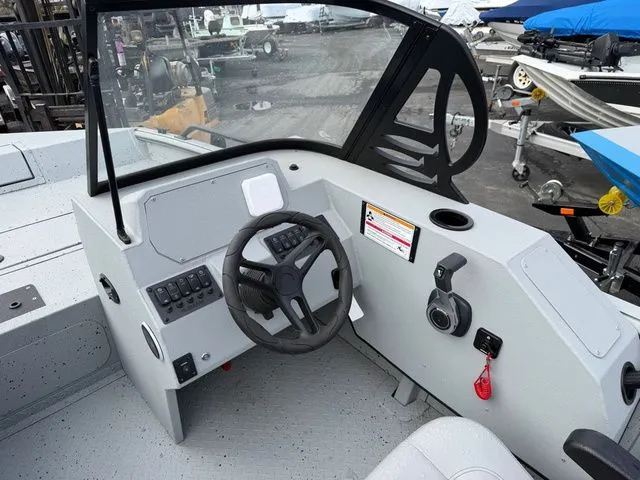 Slide: The Image of Interior view of SeaArk Protege 200 boat, model year 2026. - 13