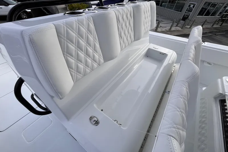 Slide: The Image of Luxurious seating on 2026 Invincible 33 Catamaran with diamond-stitched upholstery. - 14