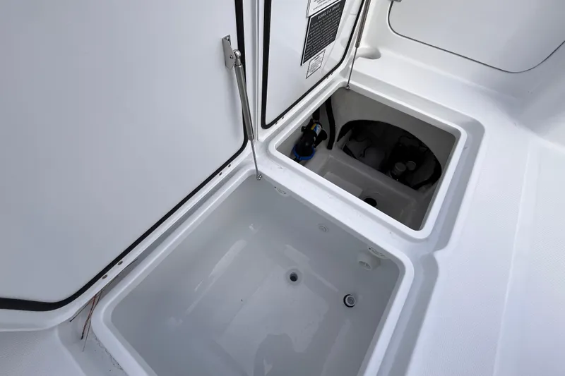 Slide: The Image of 2026 Invincible 33 Catamaran storage compartments, showcasing sleek design and functionality. - 31