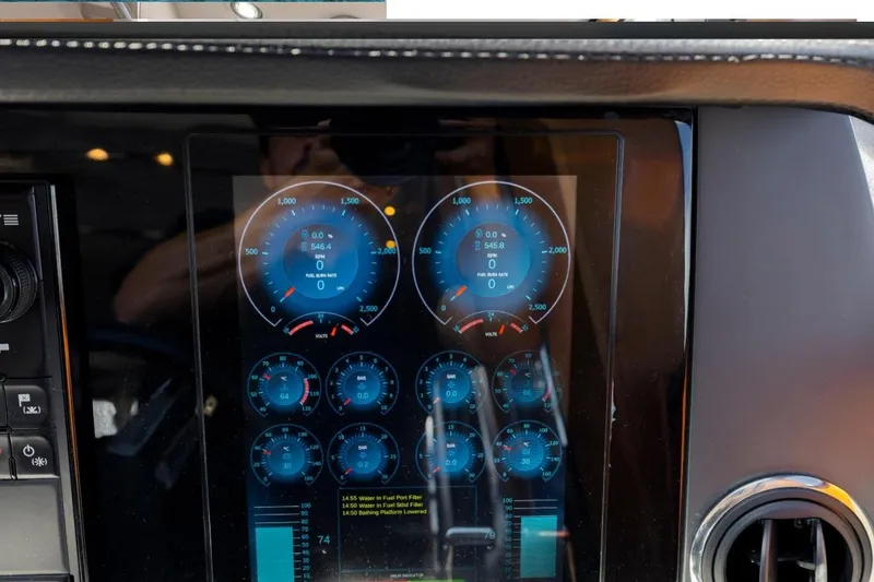 Slide: The Image of Dashboard display of a 2017 Princess S65 yacht with digital gauges and controls. - 25