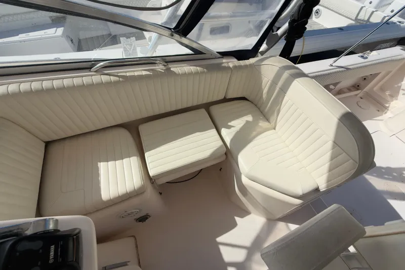 Slide: The Image of 2005 Grady-White Express 330 boat interior with cream leather seating. - 43