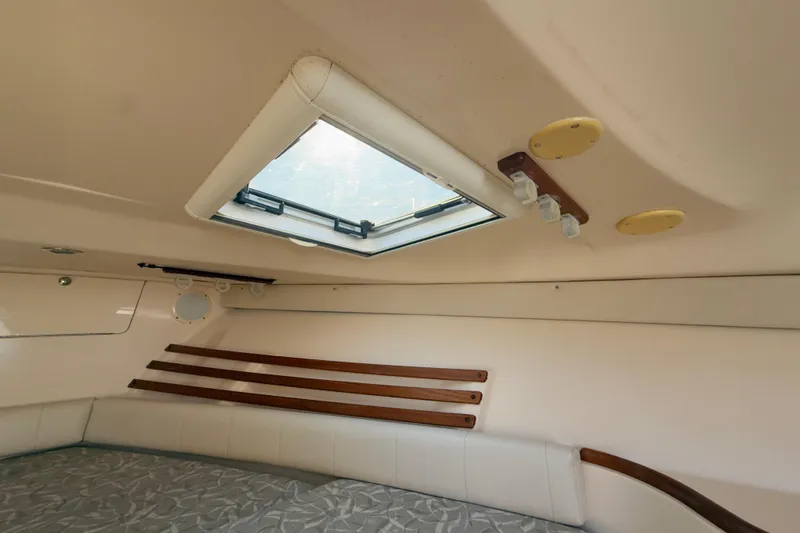 Slide: The Image of Interior cabin of 2005 Grady-White Express 330 with skylight and seating. - 5