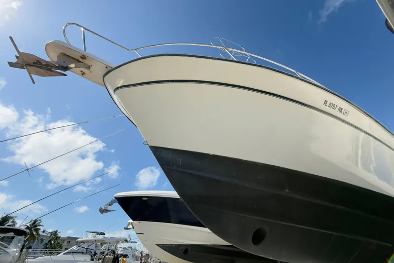 Slide: The Image of 2005 Grady-White Express 330 boat docked under clear blue sky. - 66