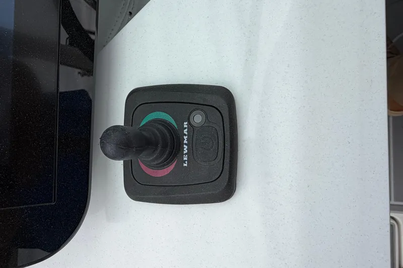 Slide: The Image of Joystick control on 2026 Regal LS9 Surf boat dashboard. - 12