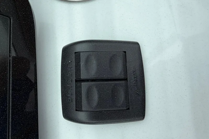 Slide: The Image of 2026 Regal LS9 Surf boat control panel with dual switches. - 14