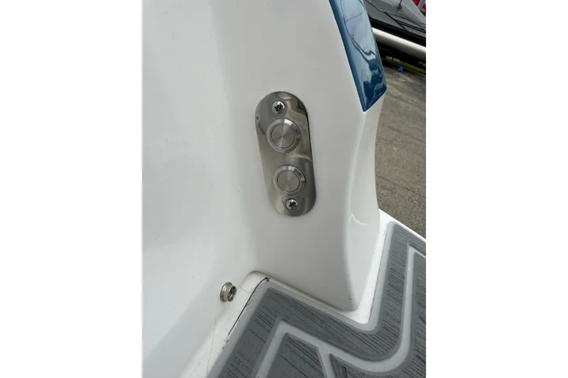 Slide: The Image of 2026 Regal LS9 Surf boat detail with stainless steel fittings and textured flooring. - 17