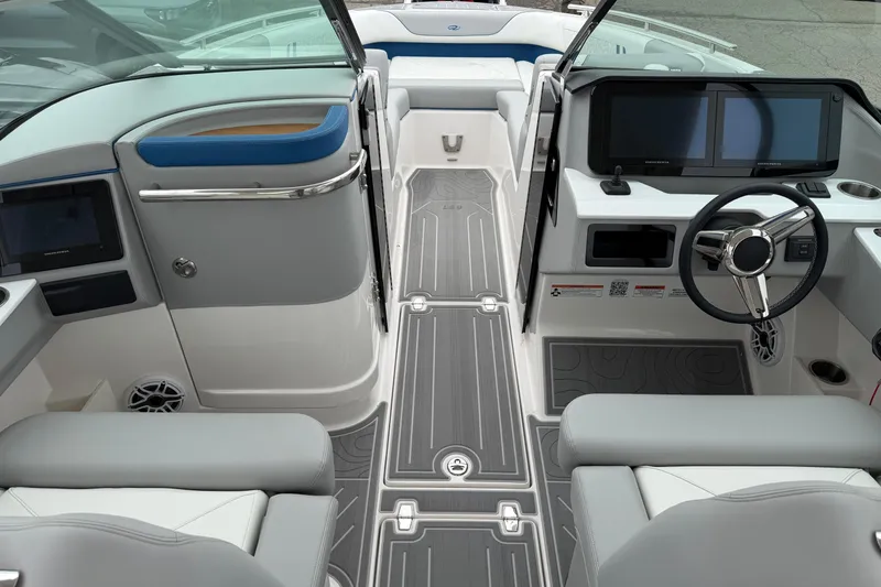 Slide: The Image of Luxurious interior of 2026 Regal LS9 Surf boat with modern dashboard and seating. - 20