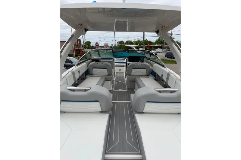 Slide: The Image of 2026 Regal LS9 Surf boat interior with sleek seating and modern design. - 24