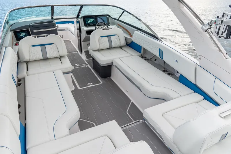 Slide: The Image of Manufacturer Provided Image: 2026 Regal LS9 Surf boat interior with luxurious white seating and modern design. - 6