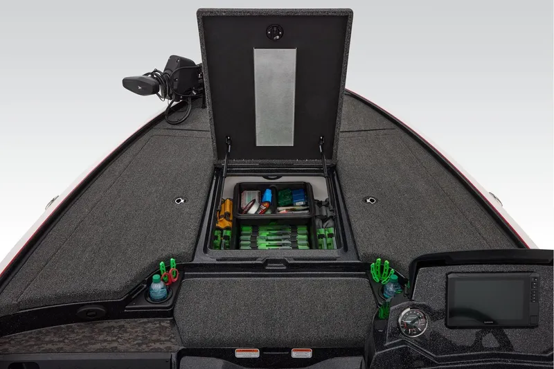 Slide: The Image of 2026 Nitro Z19 XL Pro boat storage compartment with open lid and cup holders. - 19