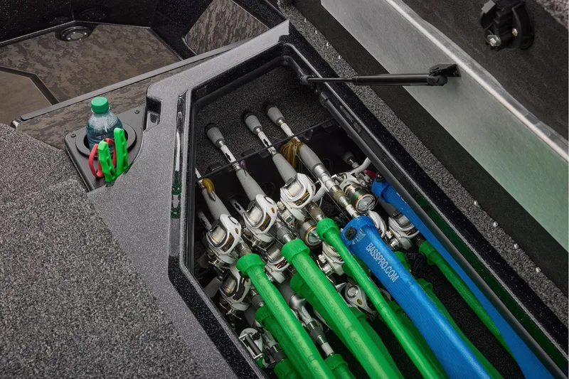 Slide: The Image of 2026 Nitro Z19 XL Pro boat storage compartments with Garmin electronics and organized interior layout. - 24