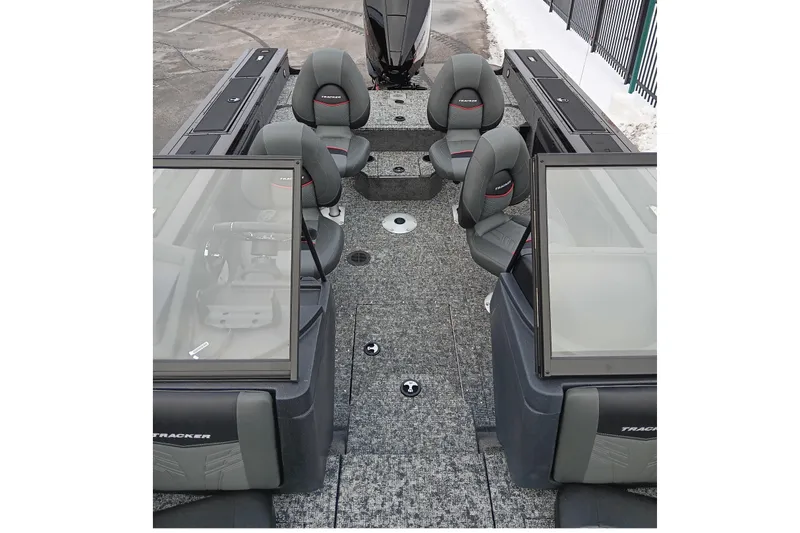Slide: The Image of 2026 Tracker Targa V-19 Combo boat interior with seating and windshield. - 7
