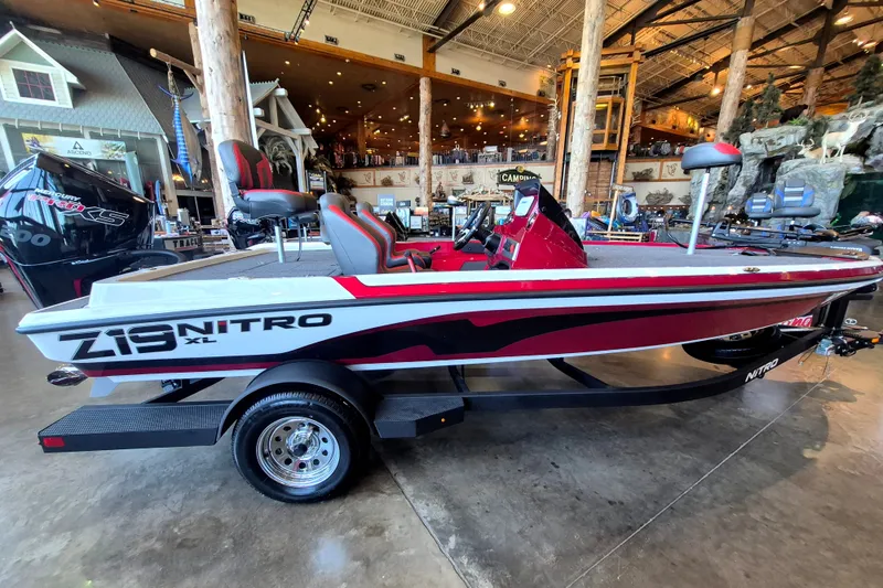 Slide: The Image of 2026 Nitro Z19 XL boat displayed indoors, featuring sleek design and modern features. - 3