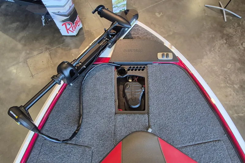 Slide: The Image of Front deck of 2026 Nitro Z19 XL boat with trolling motor and storage compartment. - 9