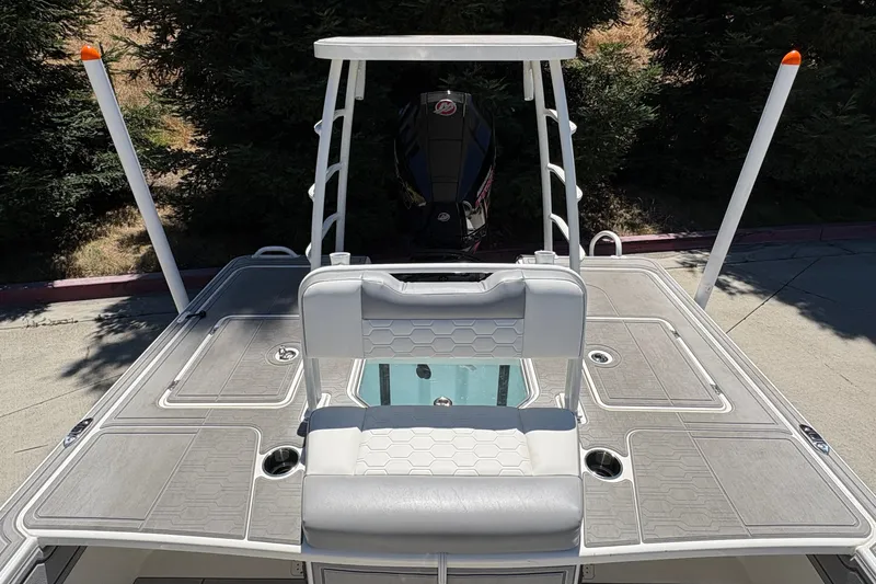 Slide: The Image of 2026 Mako 18 Pro Skiff boat with sleek design and modern features. - 13