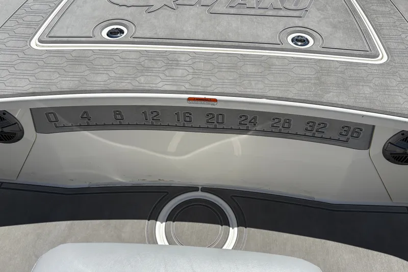 Slide: The Image of 2026 Mako 18 Pro Skiff deck with measurement scale and logo detail. - 31