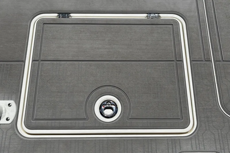 Slide: The Image of Hatch detail of 2026 Mako 18 Pro Skiff boat deck. - 35