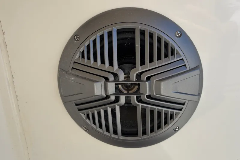 Slide: The Image of Close-up of a speaker grille on a 2026 Mako 18 Pro Skiff boat. - 17