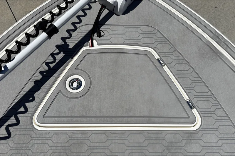 Slide: The Image of Deck of 2026 Mako 18 Pro Skiff with modern design and hatch detail. - 34