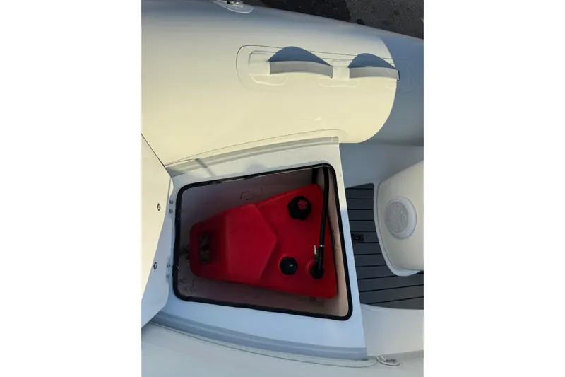 Slide: The Image of 2022 AB Inflatables Alumina 11 ALX storage compartment with red fuel tank. - 14