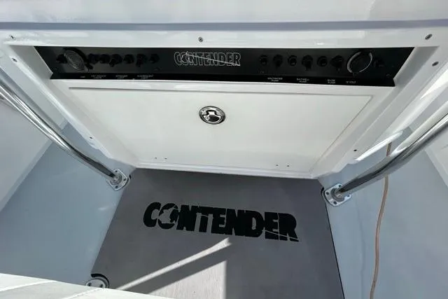 Slide: The Image of 2006 Contender 21 Open boat console with logo and control panel. - 16