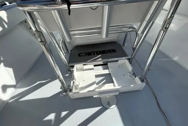 Slide: The Image of 2006 Contender 21 Open boat interior with stainless steel fittings and Contender branding. - 18