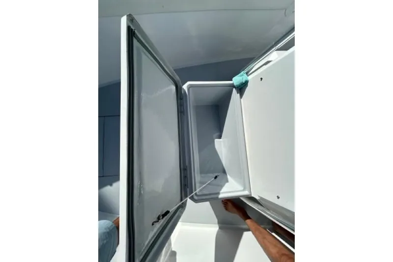 Slide: The Image of Open storage compartment on 2006 Contender 21 Open boat, viewed from above. - 5