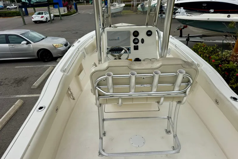 Slide: The Image of 2019 Key West 239 FS boat interior with rod holders and Garmin equipment. - 13