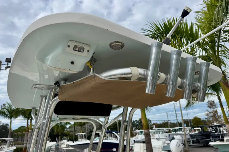 Slide: The Image of 2019 Key West 239 FS boat console with Garmin navigation and steering wheel. - 15