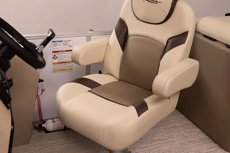 Slide: The Image of Luxurious captain's chair in 2026 SunCatcher Elite 322 SR boat interior. - 9