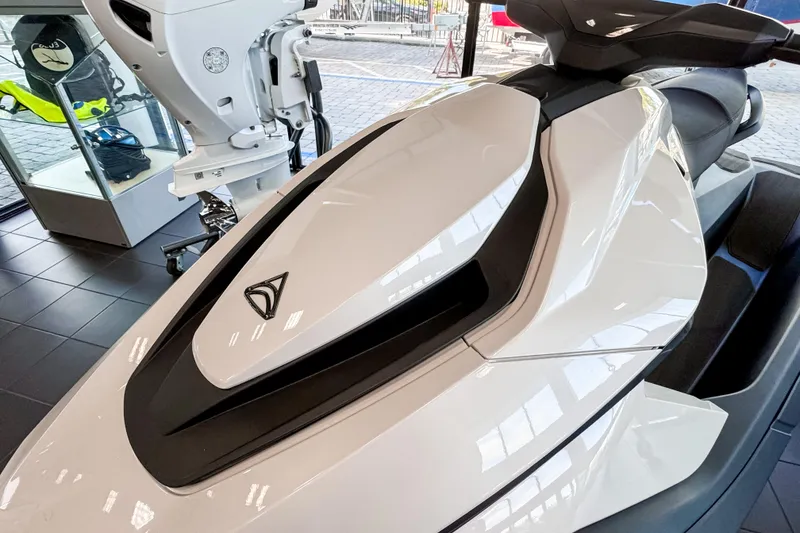 Slide: The Image of 2025 Taiga Orca P2 jet ski in showroom, sleek white design. - 5
