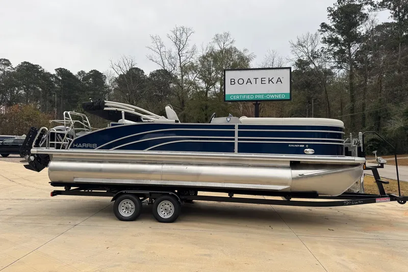 The Image of 2025 Harris Sunliner 230 pontoon boat on trailer at Boateka, certified pre-owned. - 0
