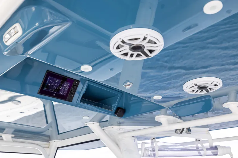 Slide: The Image of 2024 Yellowfin 42 Offshore boat interior with speakers and control panel. - 33