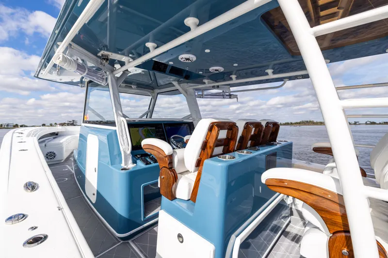 Slide: The Image of 2024 Yellowfin 42 Offshore boat interior with sleek design and advanced navigation system. - 34