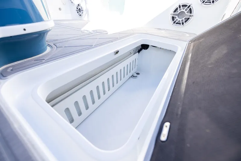 Slide: The Image of 2024 Yellowfin 42 Offshore boat storage compartment with sleek design and modern features. - 69