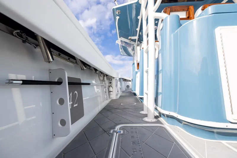 Slide: The Image of 2024 Yellowfin 42 Offshore boat deck with sleek design and modern features. - 74