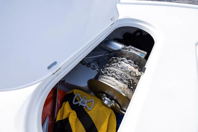 Slide: The Image of 2024 Yellowfin 42 Offshore anchor locker with chain and rope storage. - 77