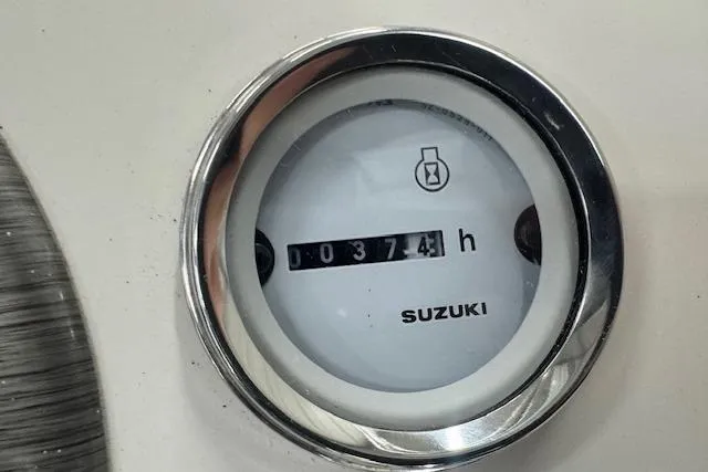 Slide: The Image of Hour meter reading 374 hours on 2021 Carolina Skiff 17 LS boat. - 4