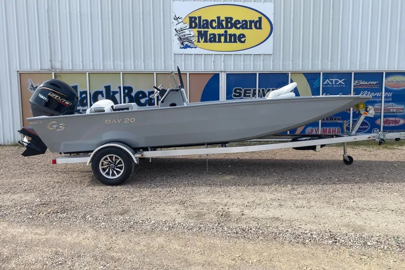 The Image of 2026 G3 Bay 20 boat on trailer at BlackBeard Marine dealership. - 1