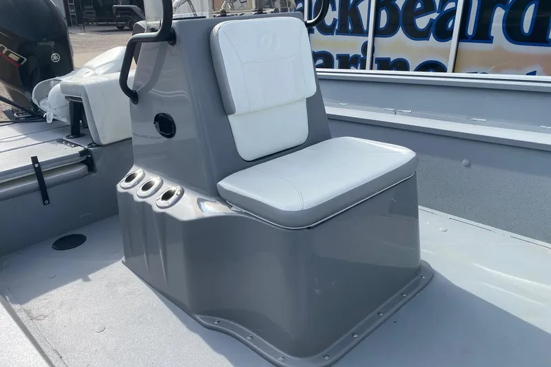 Slide: The Image of 2026 G3 Bay 20 boat seat with rod holders, featuring sleek gray and white design. - 10