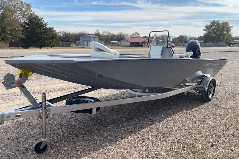 Slide: The Image of 2026 G3 Bay 20 boat on trailer, parked outdoors on gravel. - 3