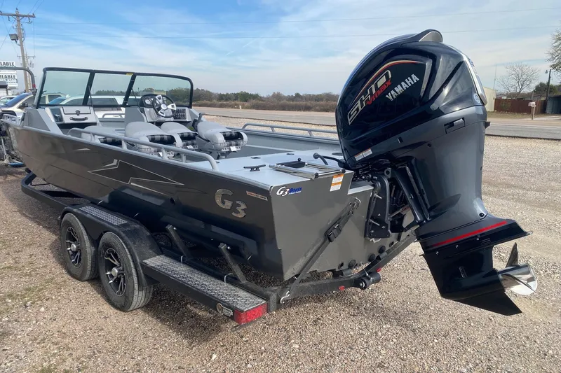 Slide: The Image of 2026 G3 Sportsman 2400 boat with Yamaha motor on a trailer. - 4