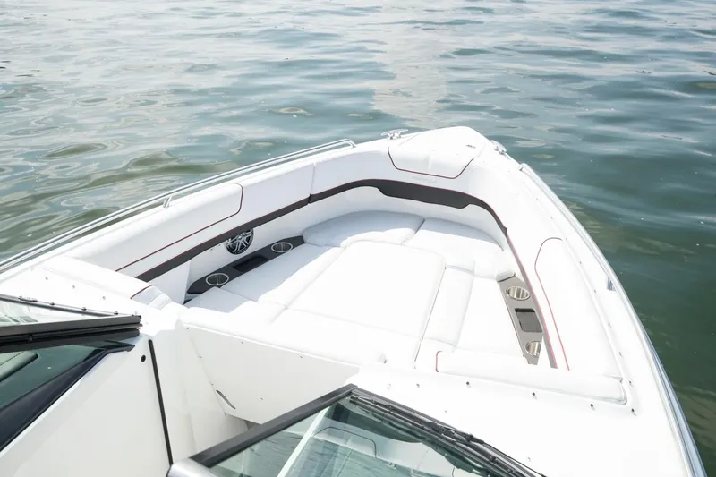 Slide: The Image of Manufacturer Provided Image: 2021 Formula 290 Bowrider boat with spacious seating on calm water. - 9