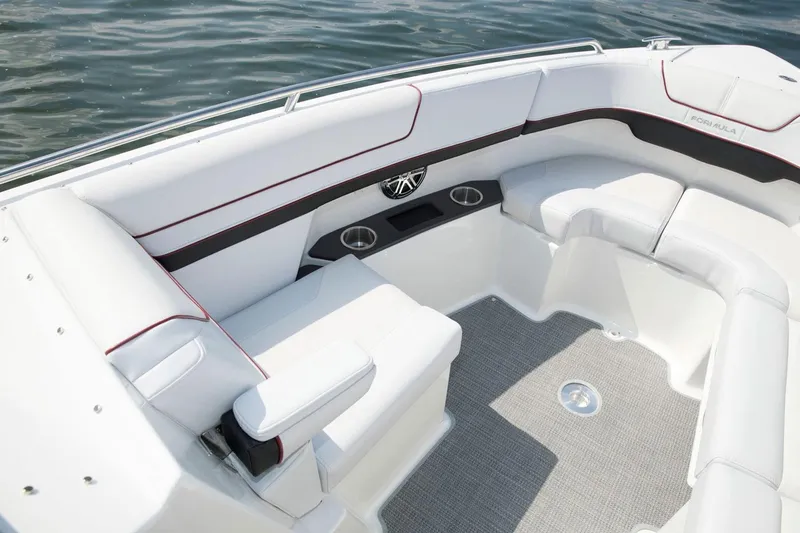 Slide: The Image of Manufacturer Provided Image: 2021 Formula 290 Bowrider interior seating area with cup holders and speaker. - 10
