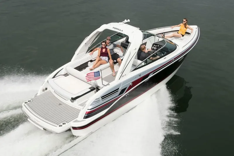 Slide: The Image of Manufacturer Provided Image: 2021 Formula 290 Bowrider cruising on water with passengers enjoying the ride. - 2