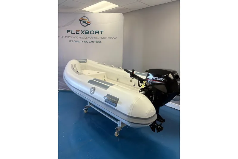 Slide: The Image of 2023 Flexboat Sr10 inflatable boat with Mercury engine in showroom. - 3