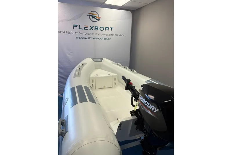 Slide: The Image of 2023 Flexboat Sr10 inflatable boat with Mercury engine in showroom. - 4